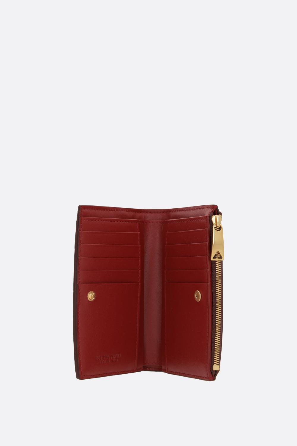 BOTTEGA VENETA portafoglio bi-fold medio Cassette in Maxi Intrecciato nappa Outlet